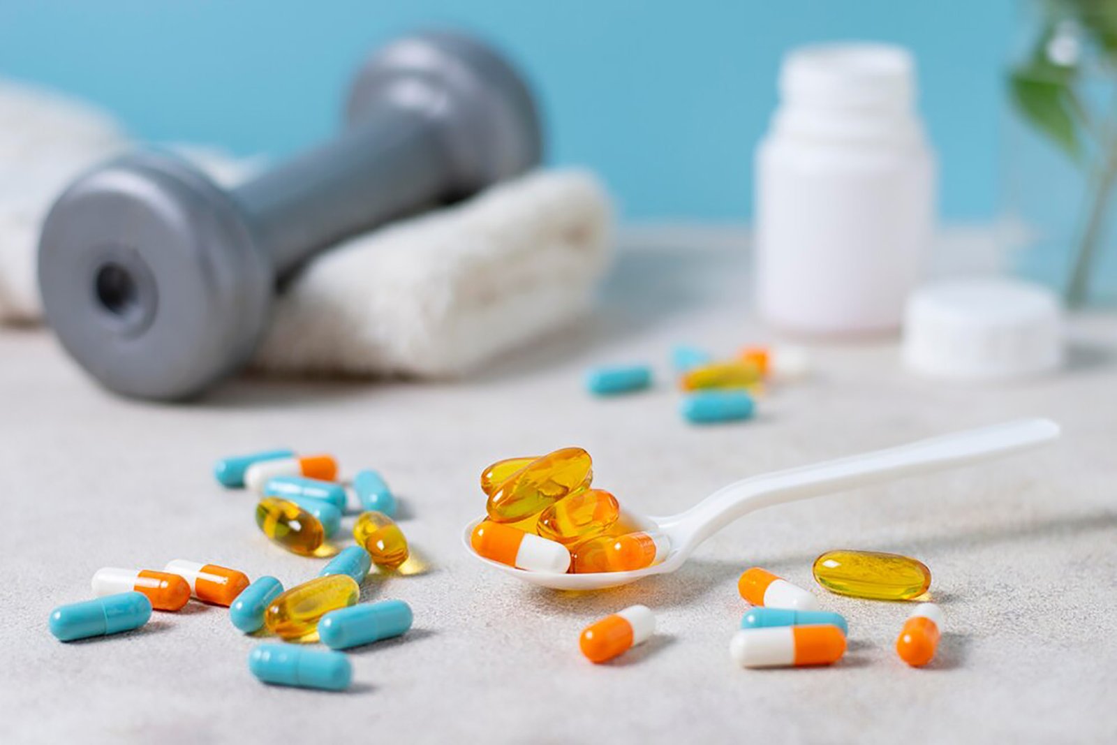 pills-arrangement-with-spoon_23-2149080611
